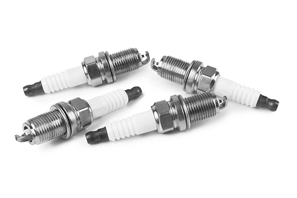 White spark plugs on isolated background